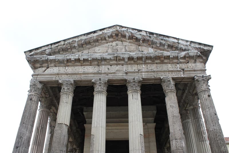 Corinthian columns and stone pediment of the Roman Temple of Augustus and Livia in Vienne