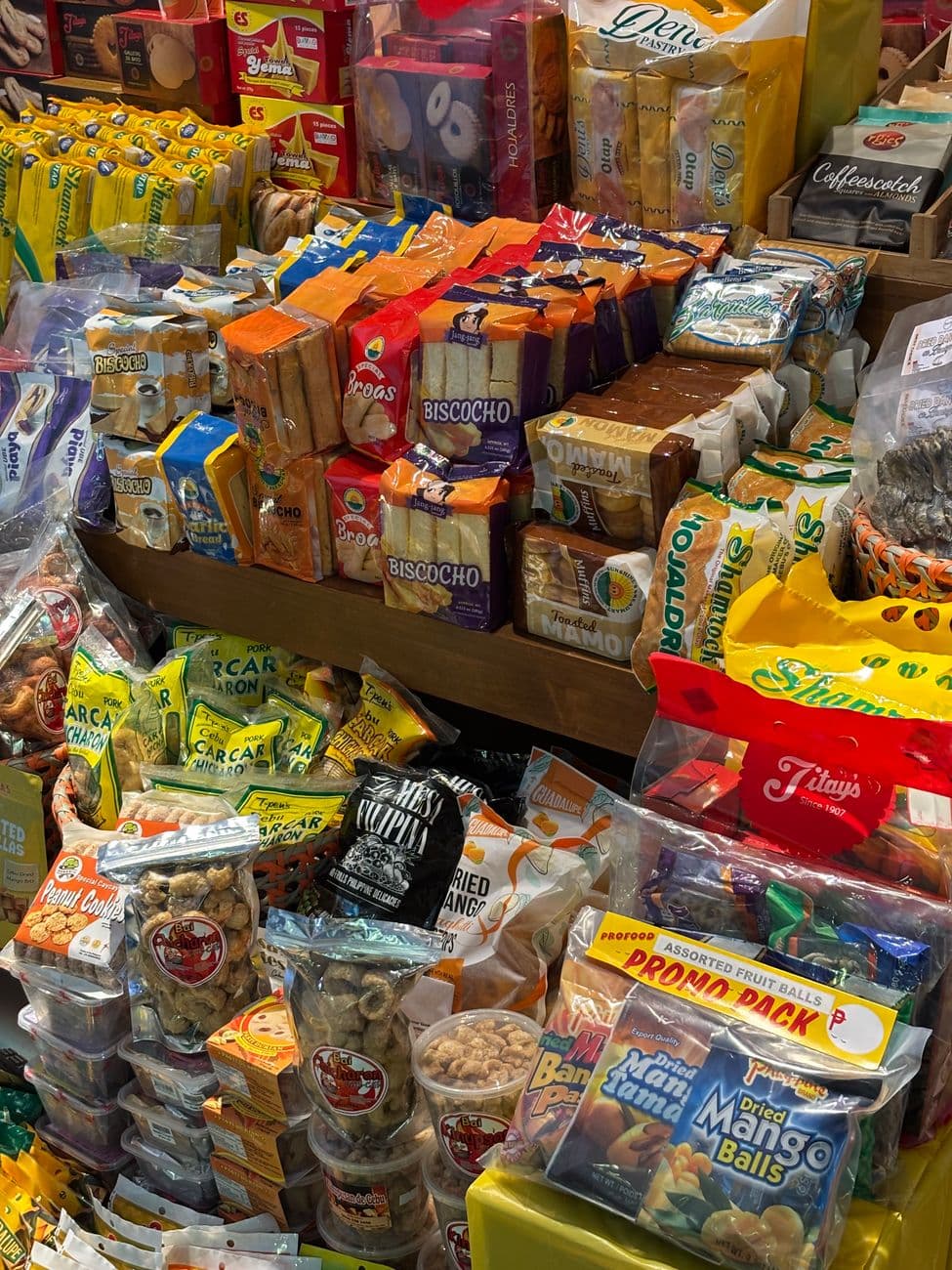 Colourful display of Filipino bakery snacks and pastries